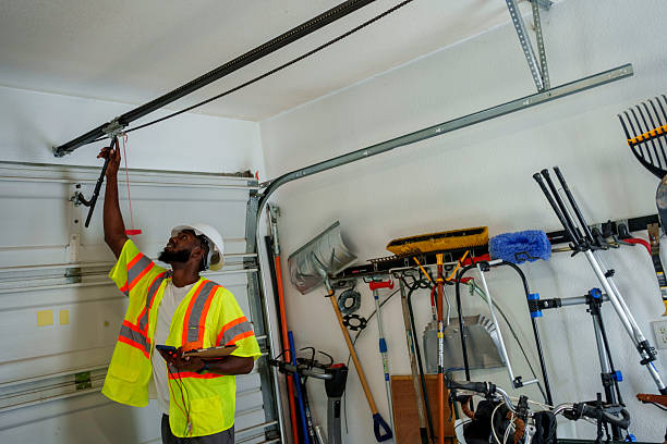Professional Garage Door Panel Replacement technician working in Seminole, TX